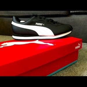 Brand new, never been worn,Puma Turin 2. Size 11